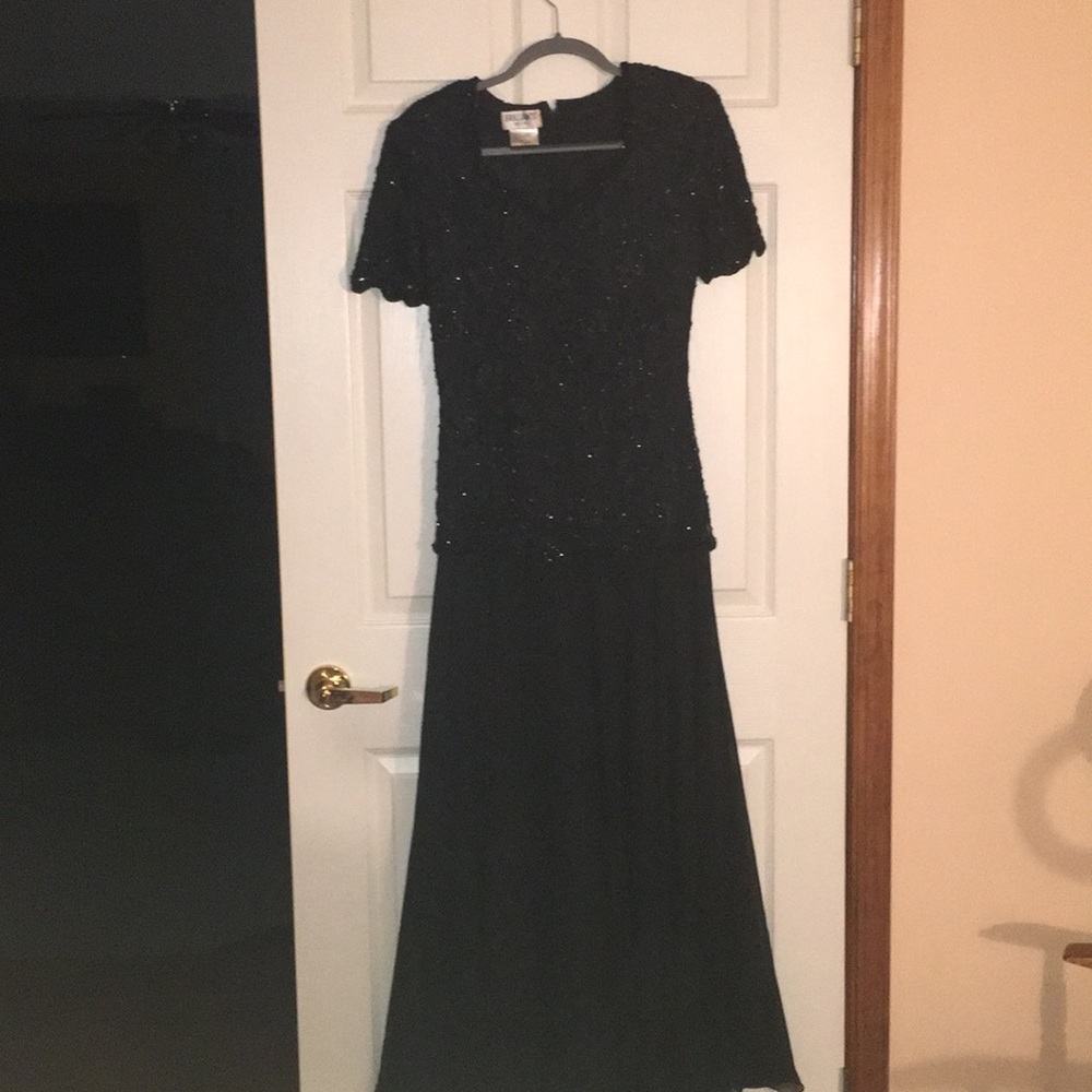 Black gown with sequin top.  Worn once, looks new